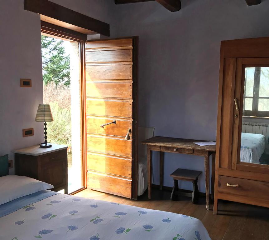 Posteľ alebo postele v izbe v ubytovaní Agriturismo Casale nel Parco dei Monti Sibillini