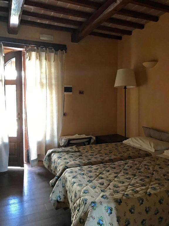 Posteľ alebo postele v izbe v ubytovaní Agriturismo Casale nel Parco dei Monti Sibillini