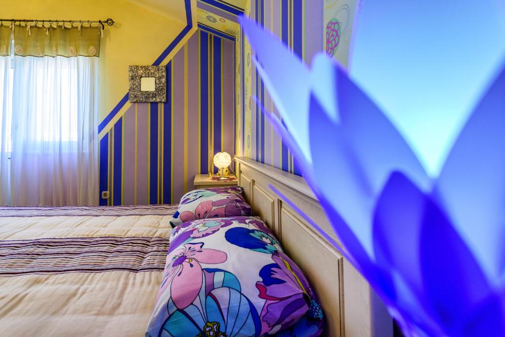 Posteľ alebo postele v izbe v ubytovaní Apartments Sunset