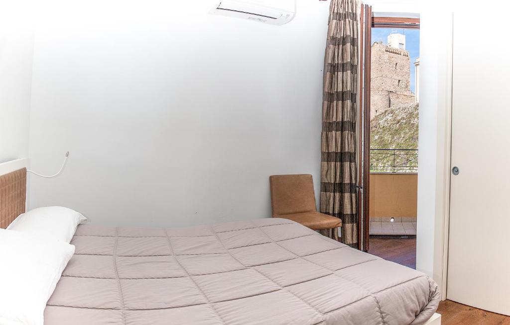 Łóżko lub łóżka w pokoju w obiekcie Iamartino Quality Rooms