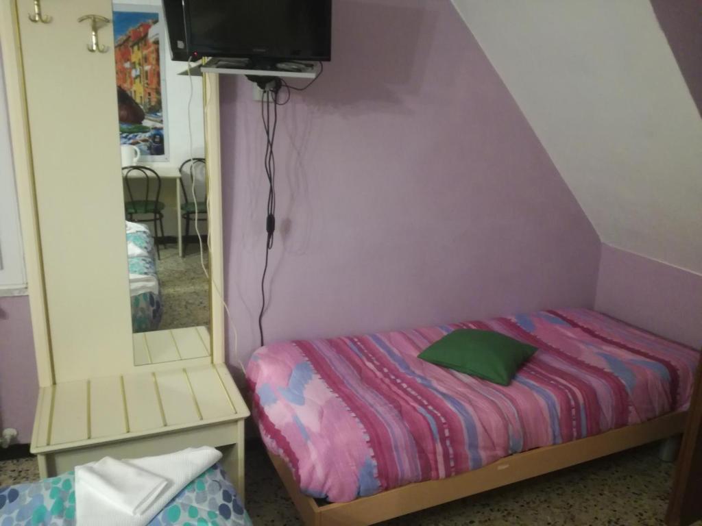 Postel nebo postele na pokoji v ubytování Hotel La Zorza