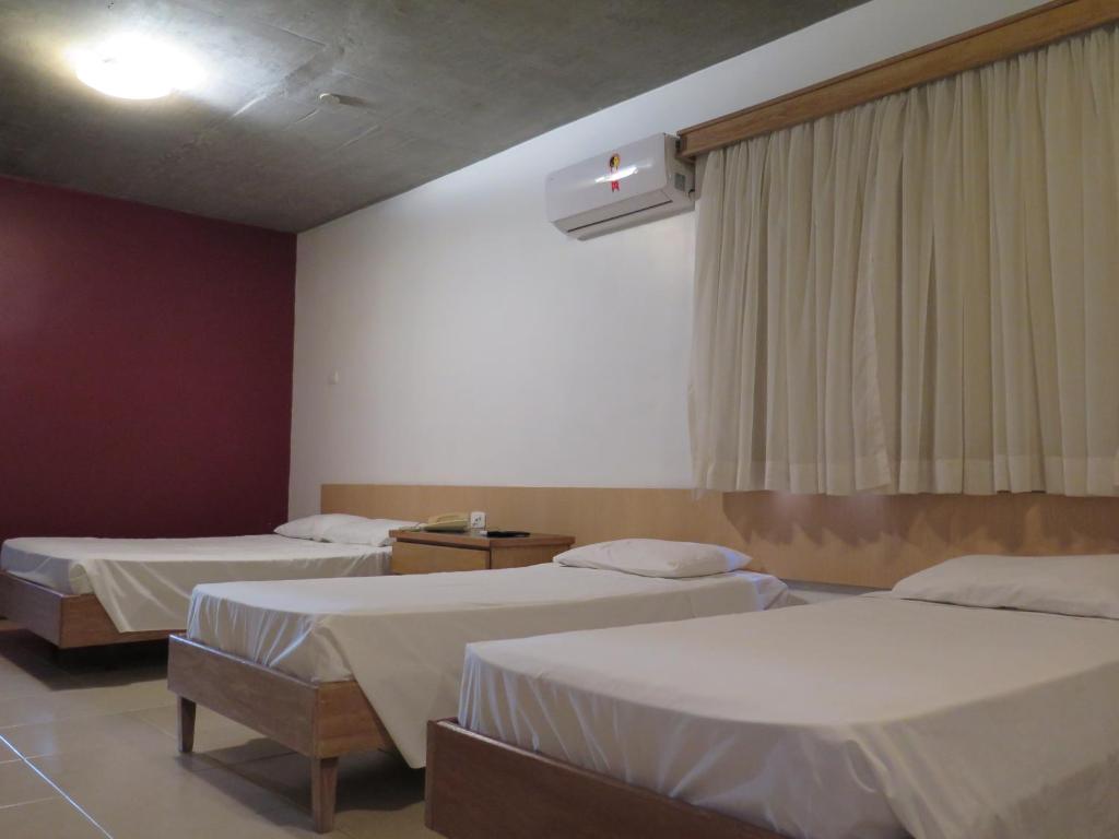 Postel nebo postele na pokoji v ubytování Hotel Ideal