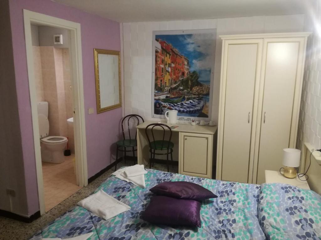 Postel nebo postele na pokoji v ubytování Hotel La Zorza