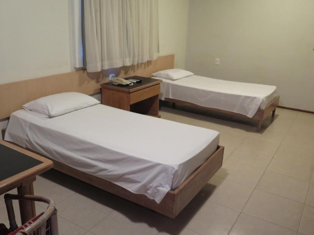 Postel nebo postele na pokoji v ubytování Hotel Ideal