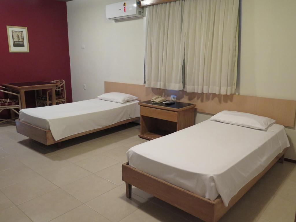 Postel nebo postele na pokoji v ubytování Hotel Ideal