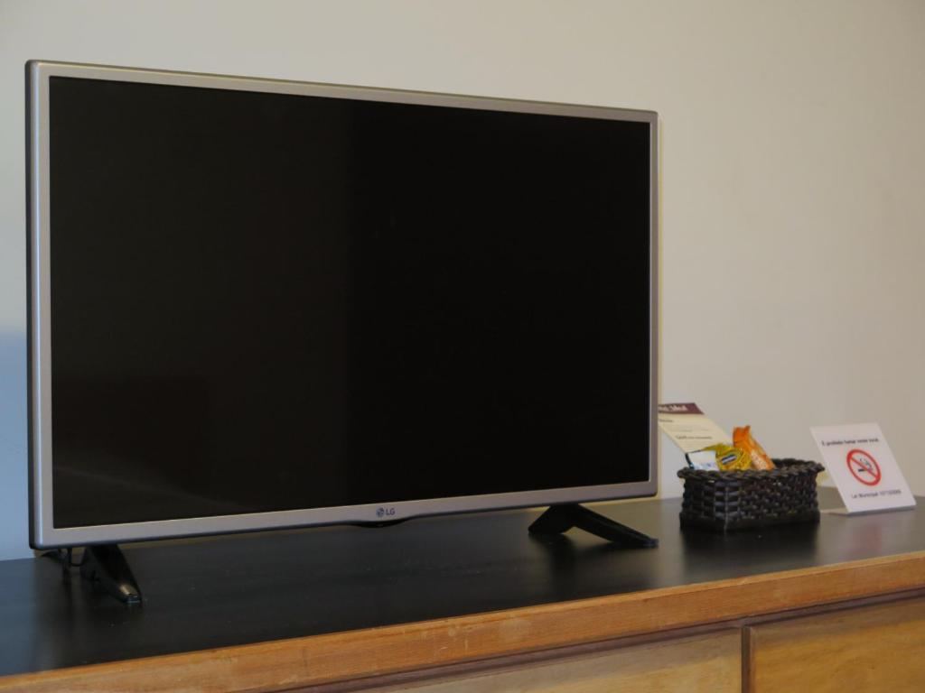 TV a/nebo společenská místnost v ubytování Hotel Ideal