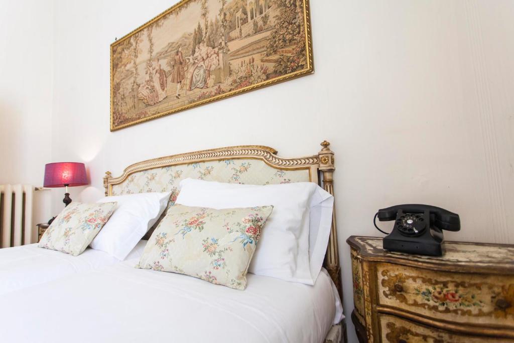 A bed or beds in a room at Trastevere Decò Apartment