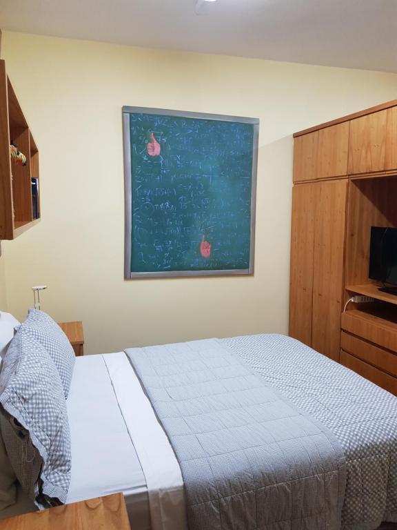 Postel nebo postele na pokoji v ubytování OKE Apart Hotel