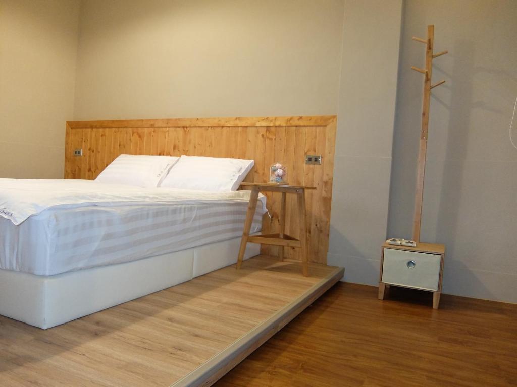 Postel nebo postele na pokoji v ubytování Xin Yuan Hang Homestay