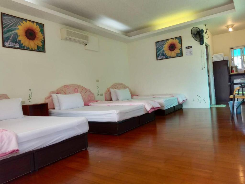 Postel nebo postele na pokoji v ubytování Chin Shan B&B