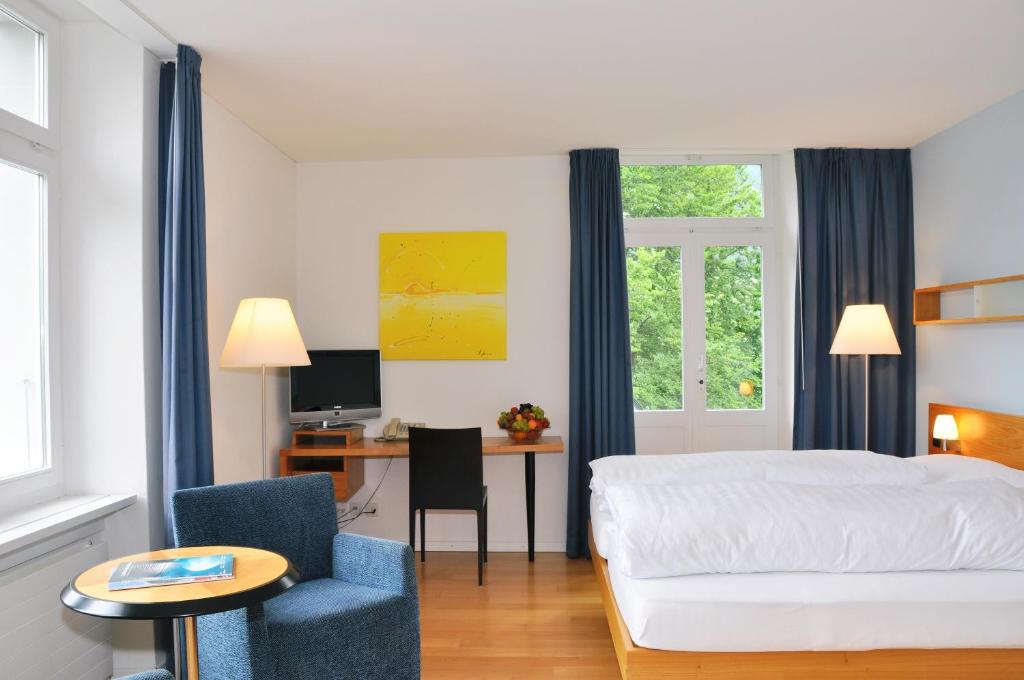 Postel nebo postele na pokoji v ubytování Hotel Fravi