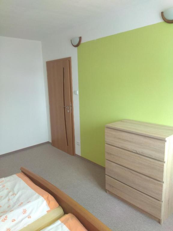 Postel nebo postele na pokoji v ubytování Holiday Home U Fišerů