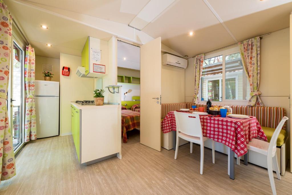 Kuchyň nebo kuchyňský kout v ubytování Camping Village Mareblu