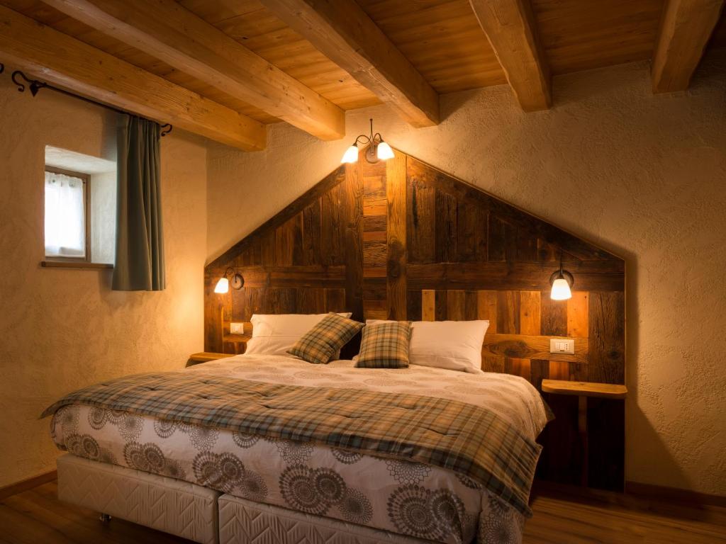 Postel nebo postele na pokoji v ubytování Chambres d'hôtes La Moraine Enchantée