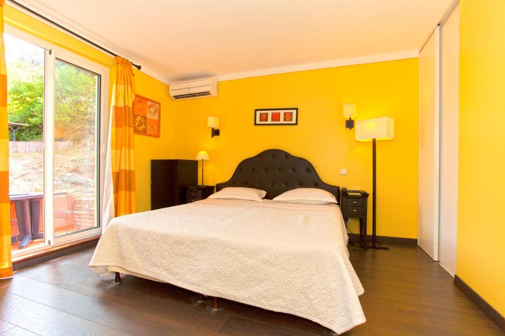 Postel nebo postele na pokoji v ubytování Hotel Macchia e Mare