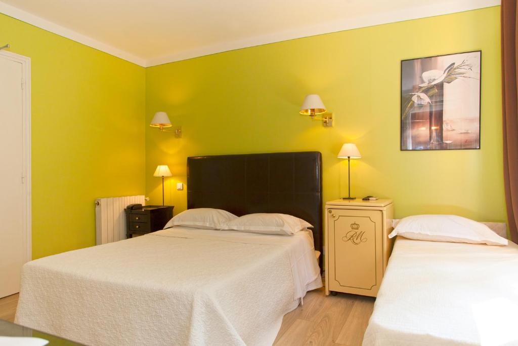 Postel nebo postele na pokoji v ubytování Hotel Macchia e Mare