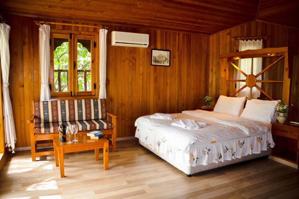 Postel nebo postele na pokoji v ubytování Arcadia Hotel