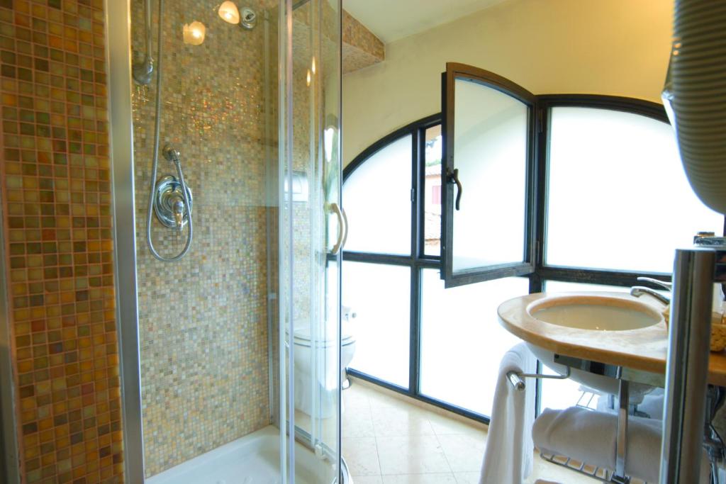 Koupelna v ubytování Hotel L'Antico Pozzo