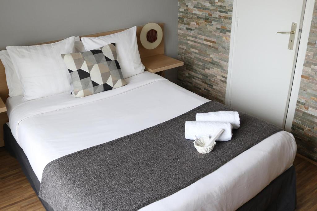 Postel nebo postele na pokoji v ubytování Hotel Le Transat Bleu