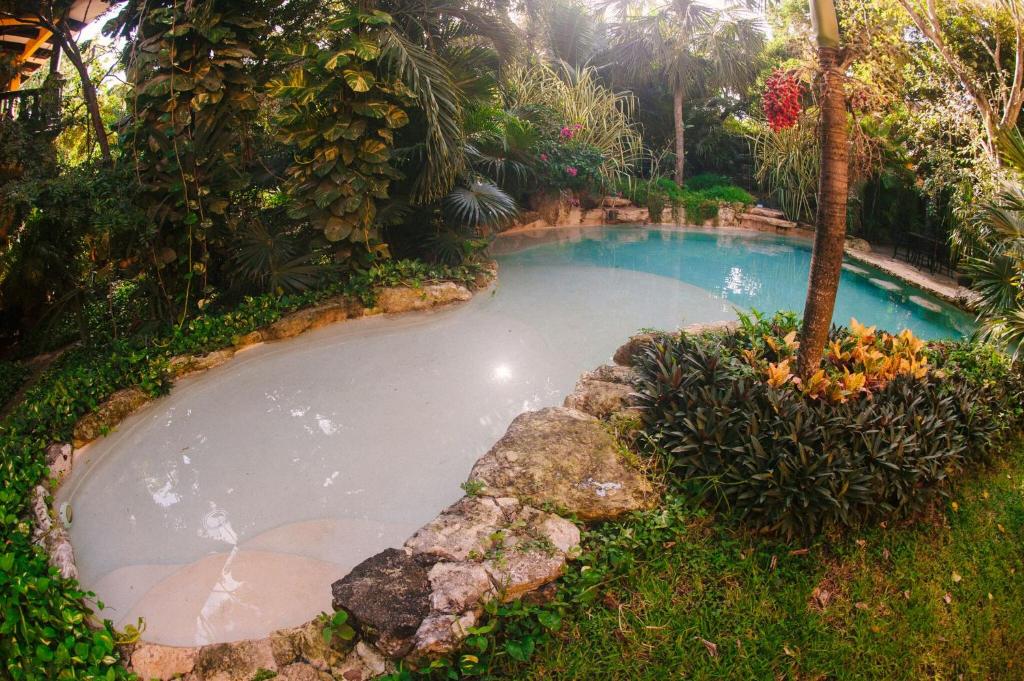 Bazén v ubytování Hacienda Xcaret nebo v jeho okolí