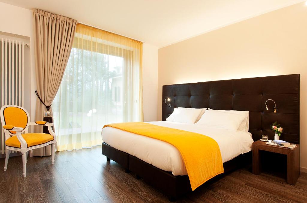 Postel nebo postele na pokoji v ubytování Bed&Garden