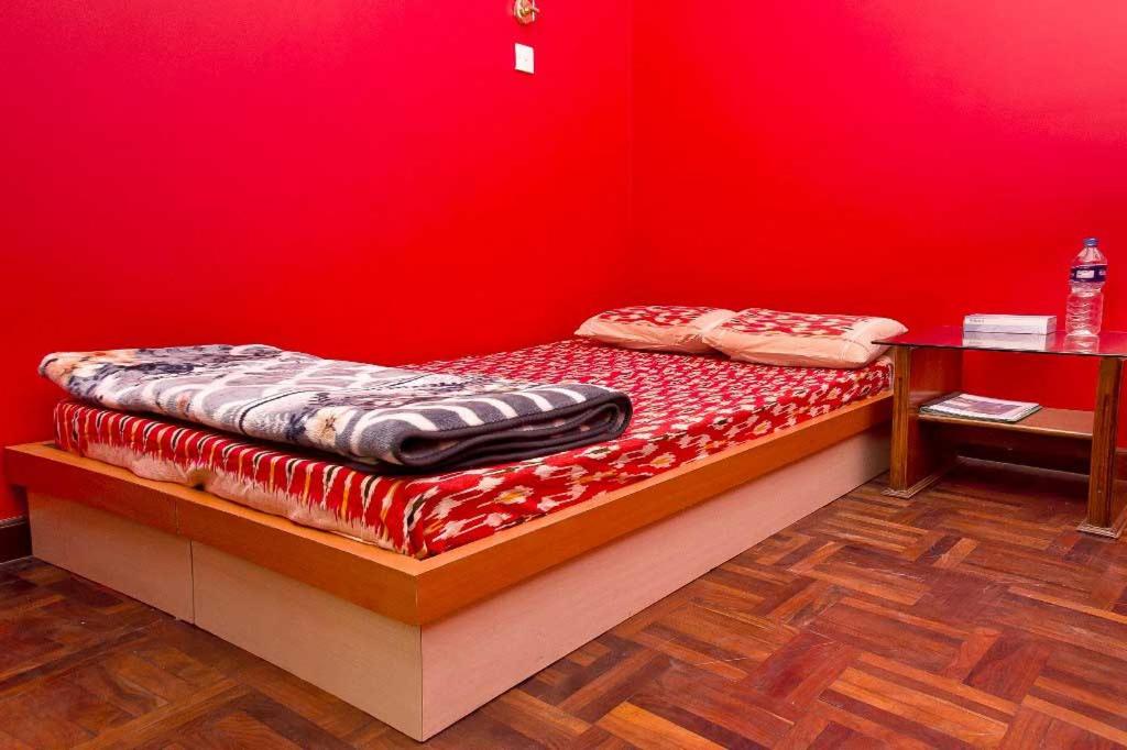 Postel nebo postele na pokoji v ubytování Swagat homestay