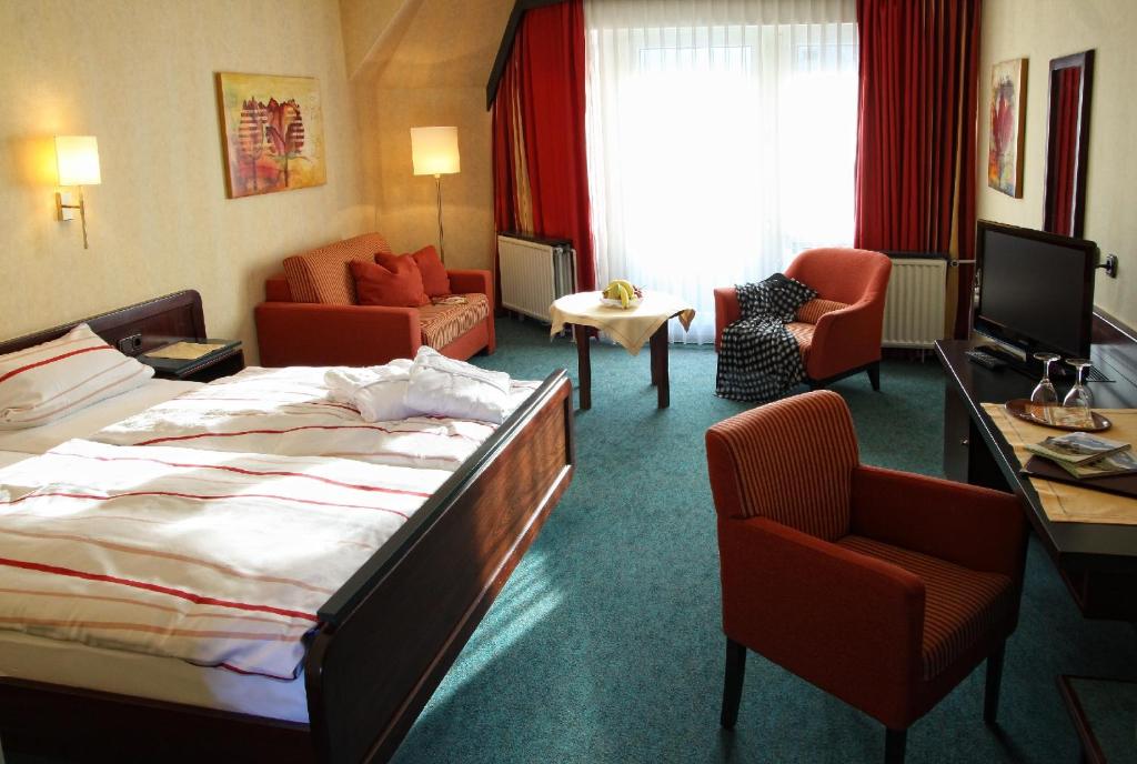 Postel nebo postele na pokoji v ubytování Hotel Central
