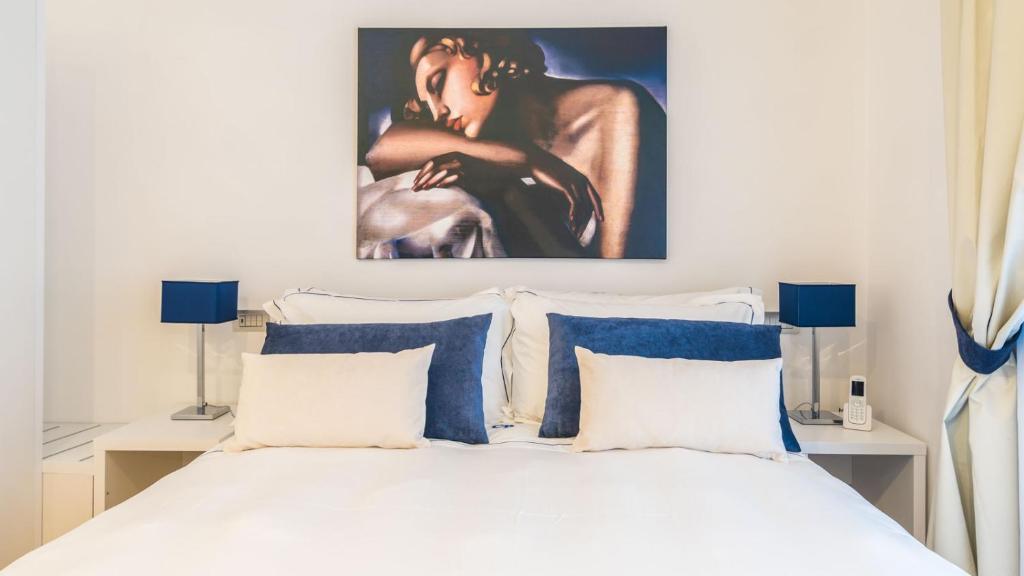 Postel nebo postele na pokoji v ubytování Cafe Bleu Relais