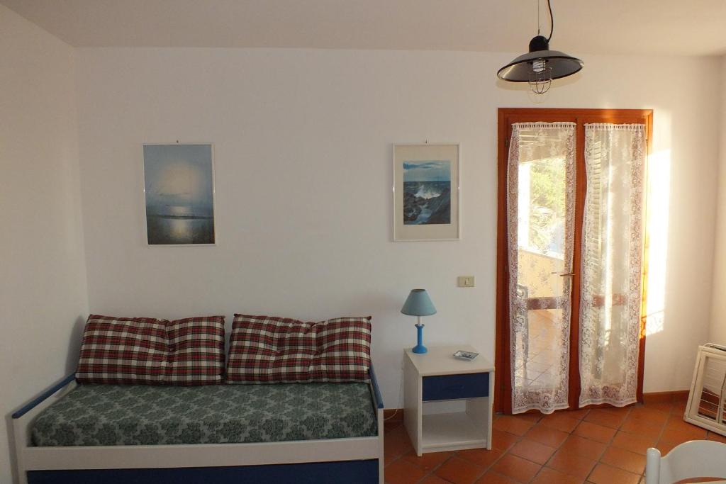 A bed or beds in a room at Le Soleil