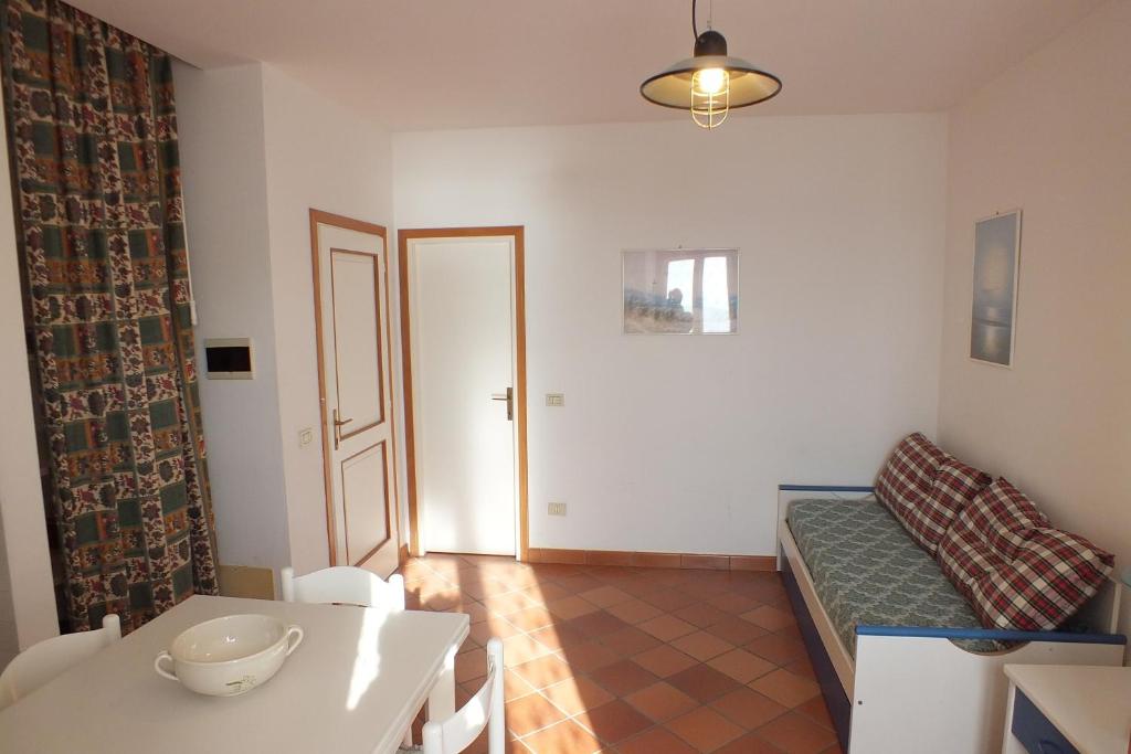 A bed or beds in a room at Le Soleil