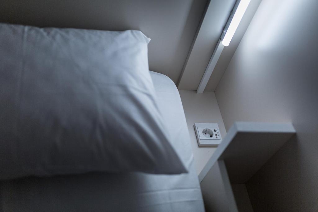 Posteľ alebo postele v izbe v ubytovaní Nubian Hostel