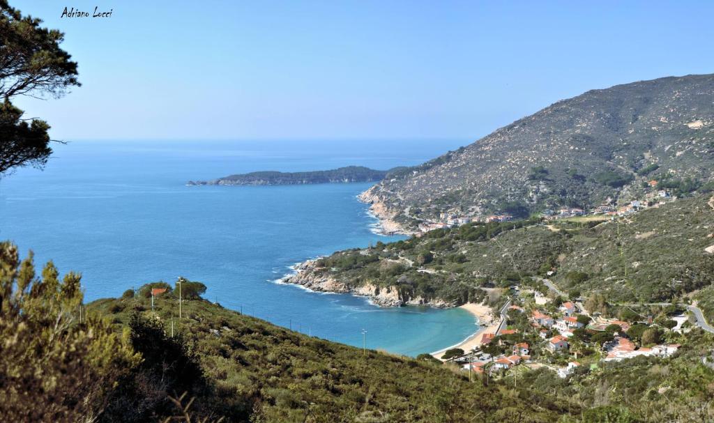 a view of the ocean from a hill at Le Soleil in Campo nell'Elba