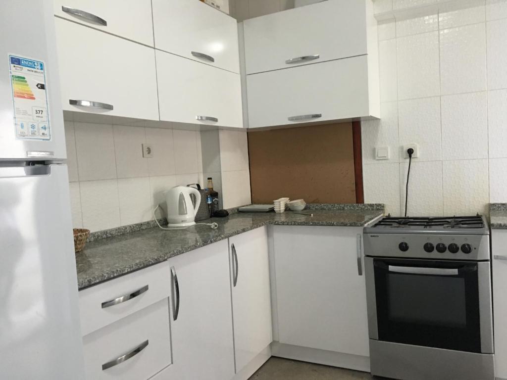 Kuchyň nebo kuchyňský kout v ubytování El Camino Hostel & Pub