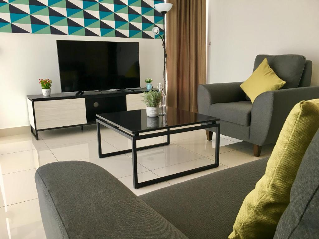 TV a/nebo společenská místnost v ubytování Pinnacle Tower Apartment Stay by Feel Suites