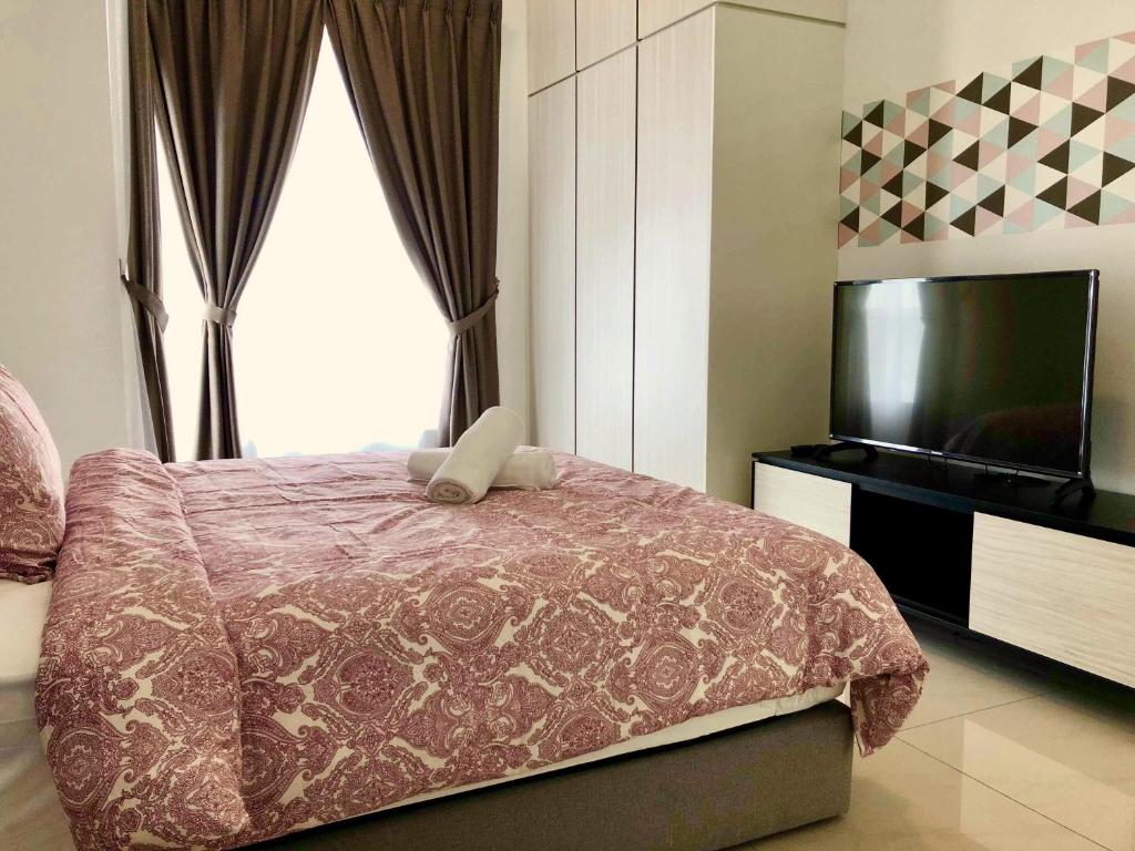TV a/nebo společenská místnost v ubytování Pinnacle Tower Apartment Stay by Feel Suites