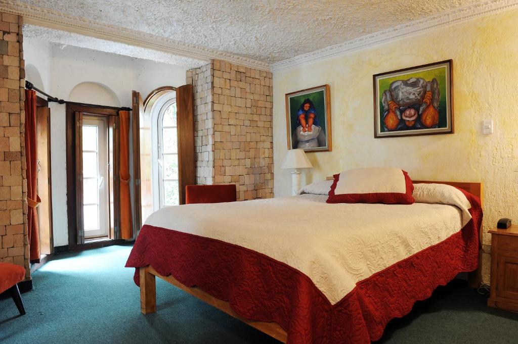 Postel nebo postele na pokoji v ubytování Boutique Hotel Antinea