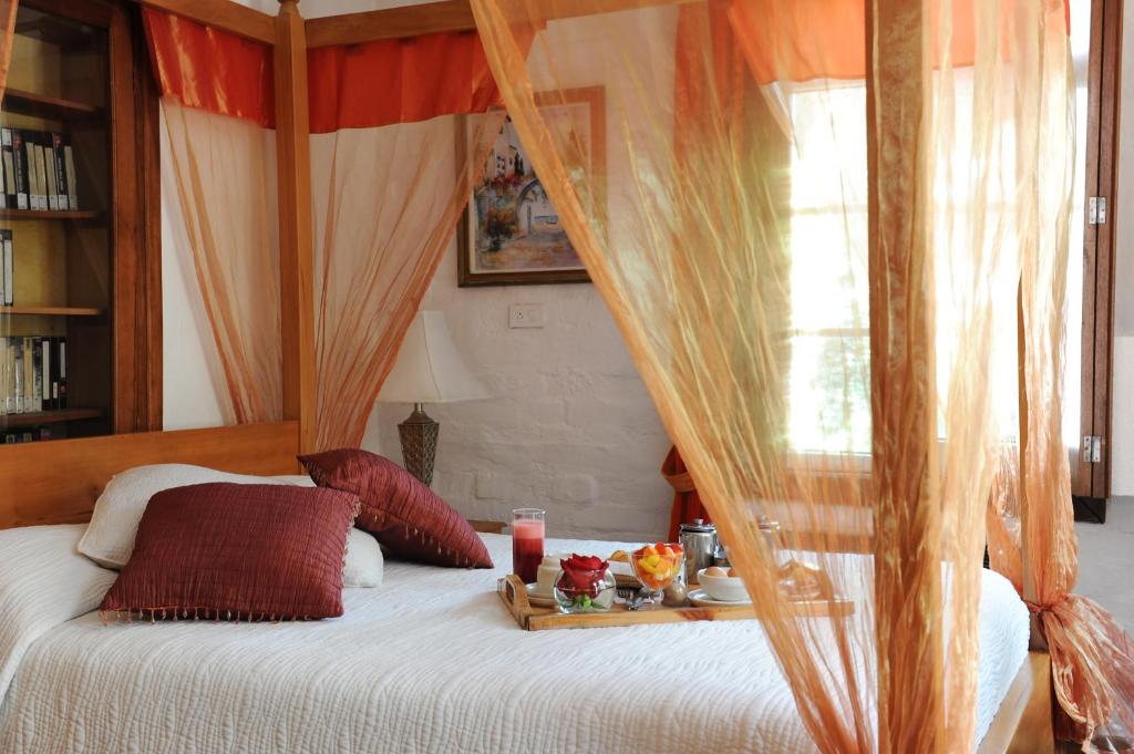 Postel nebo postele na pokoji v ubytování Boutique Hotel Antinea