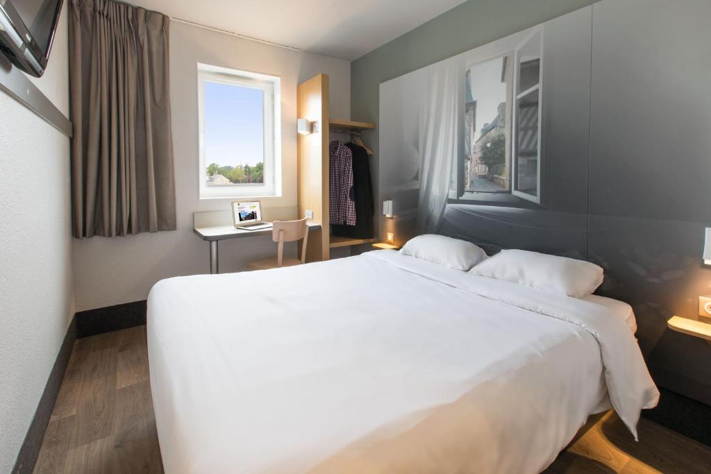 Postel nebo postele na pokoji v ubytování B&B HOTEL Brignoles
