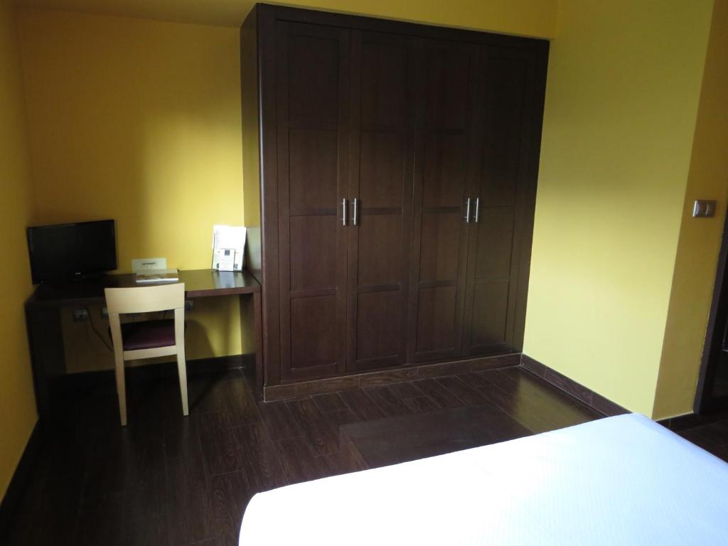 Postel nebo postele na pokoji v ubytování Euba Hotel