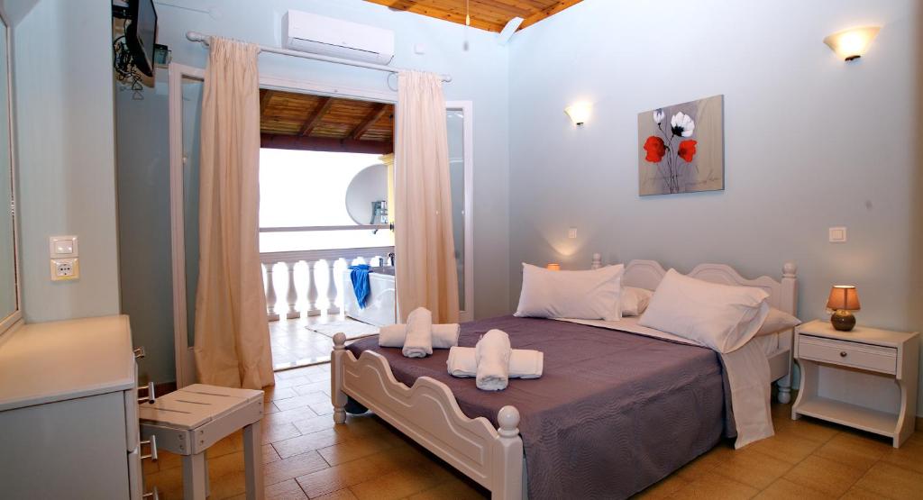 Posteľ alebo postele v izbe v ubytovaní Baracunda Apartments