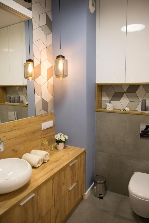 Koupelna v ubytování Apartamenty City View od WroclawApartament-pl