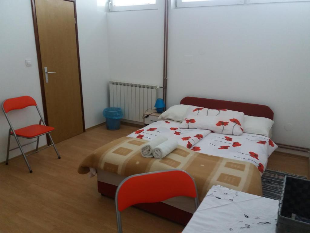 Posteľ alebo postele v izbe v ubytovaní Hostel Poslon