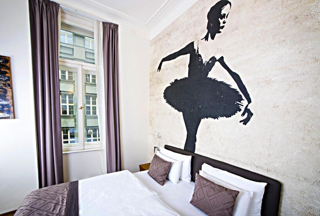Postel nebo postele na pokoji v ubytování Hotel Golden Crown