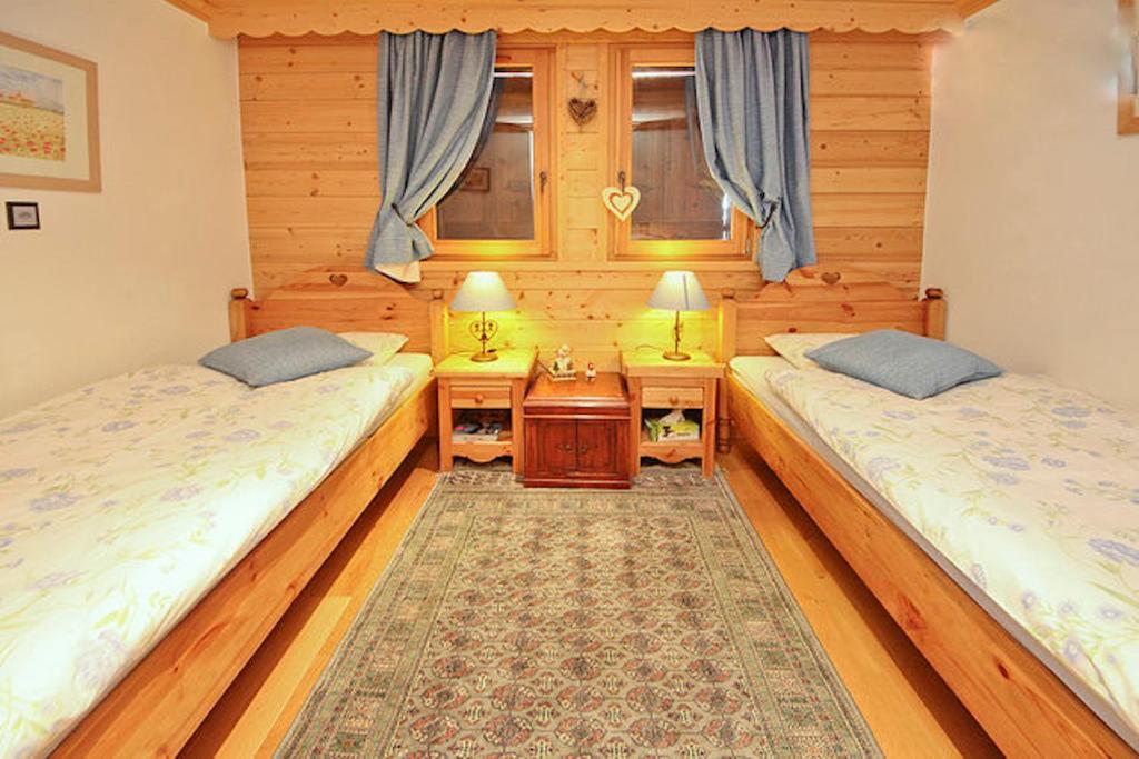 Postel nebo postele na pokoji v ubytování Chalet El Condor