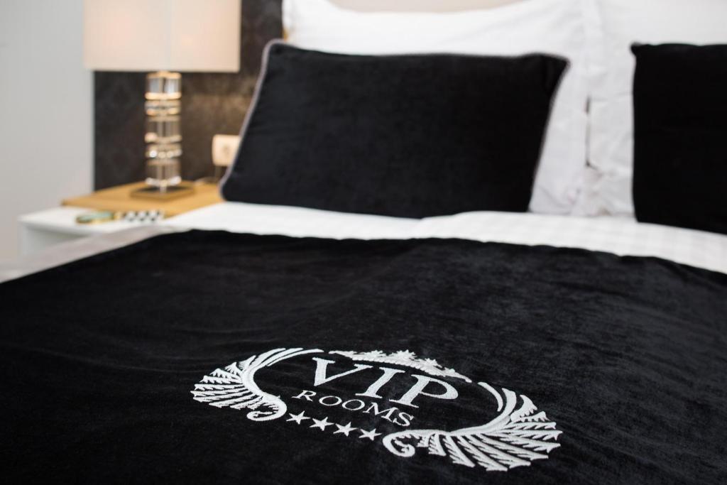 Postel nebo postele na pokoji v ubytování VIP Rooms