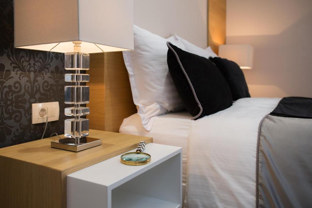 Postel nebo postele na pokoji v ubytování VIP Rooms