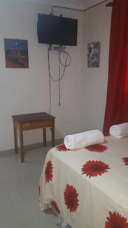Postel nebo postele na pokoji v ubytování Hostel Quintonido
