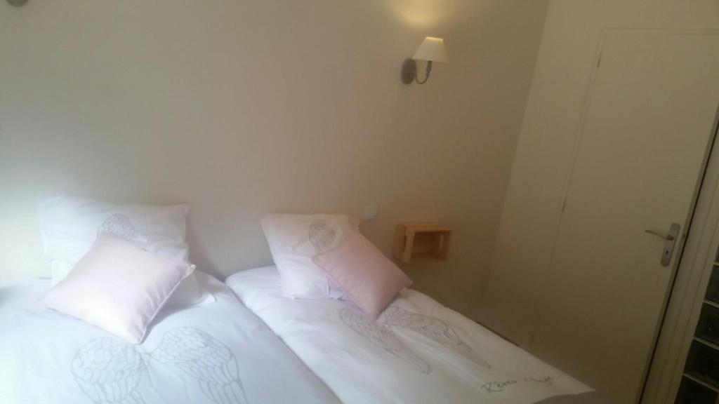 Postel nebo postele na pokoji v ubytování La Combe Joseph