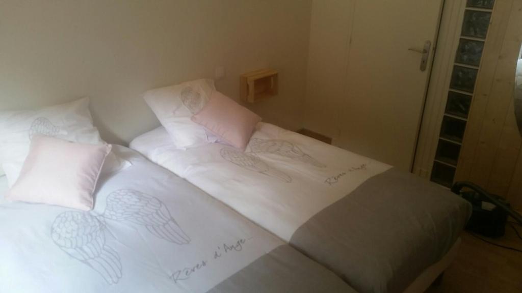 Postel nebo postele na pokoji v ubytování La Combe Joseph