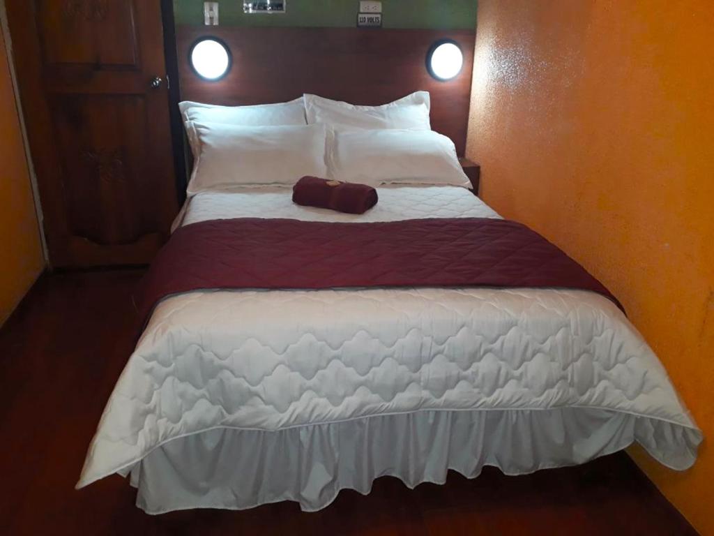 Postel nebo postele na pokoji v ubytování La Estación Hostal